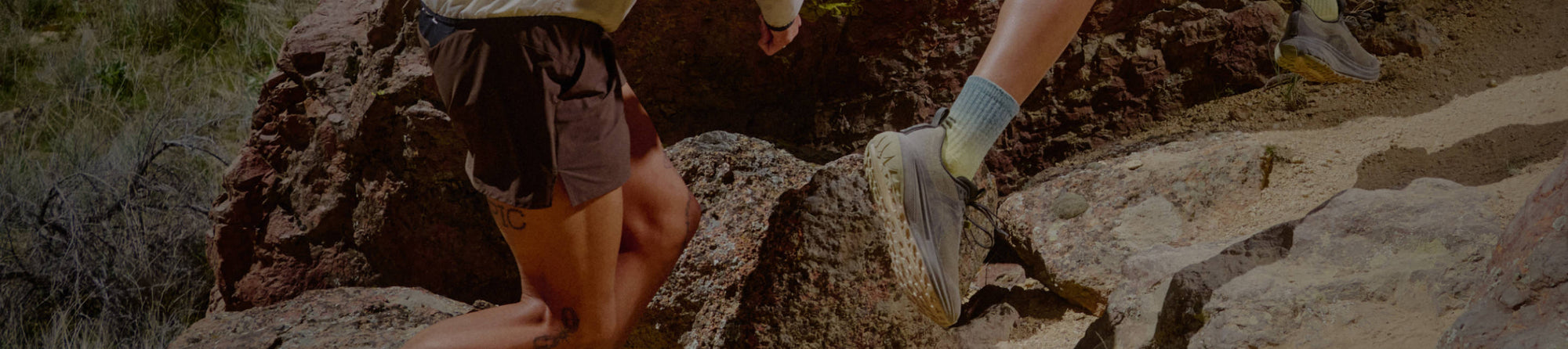 Men walking on dirt trail in Zionic hiking boot