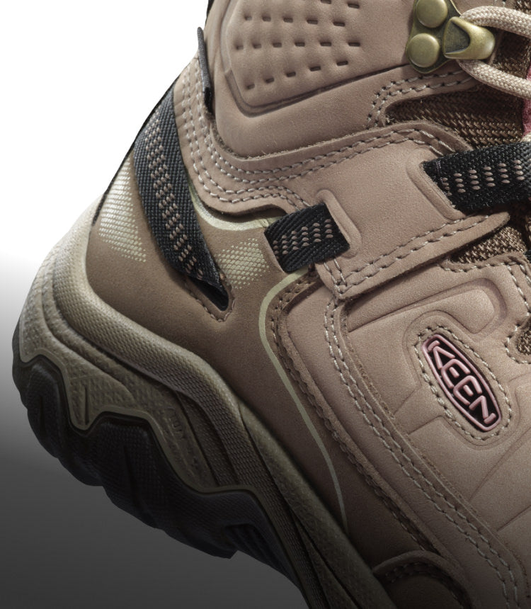 A close-up of a light pink-colored Targhee hiking boot.