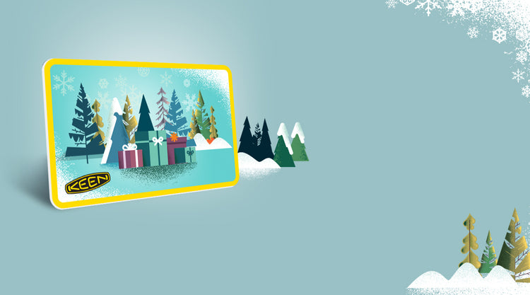 graphic of keen giftcard with presents and wintry trees on it