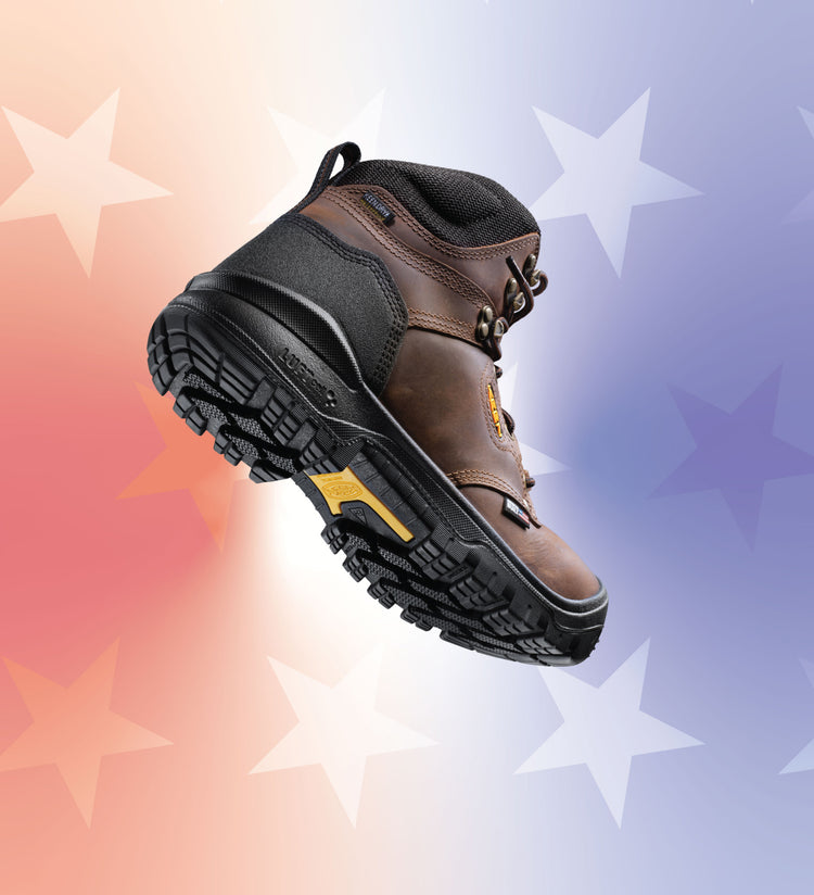 Product shot of Men's Independence work boot against red, white and blue star background. 