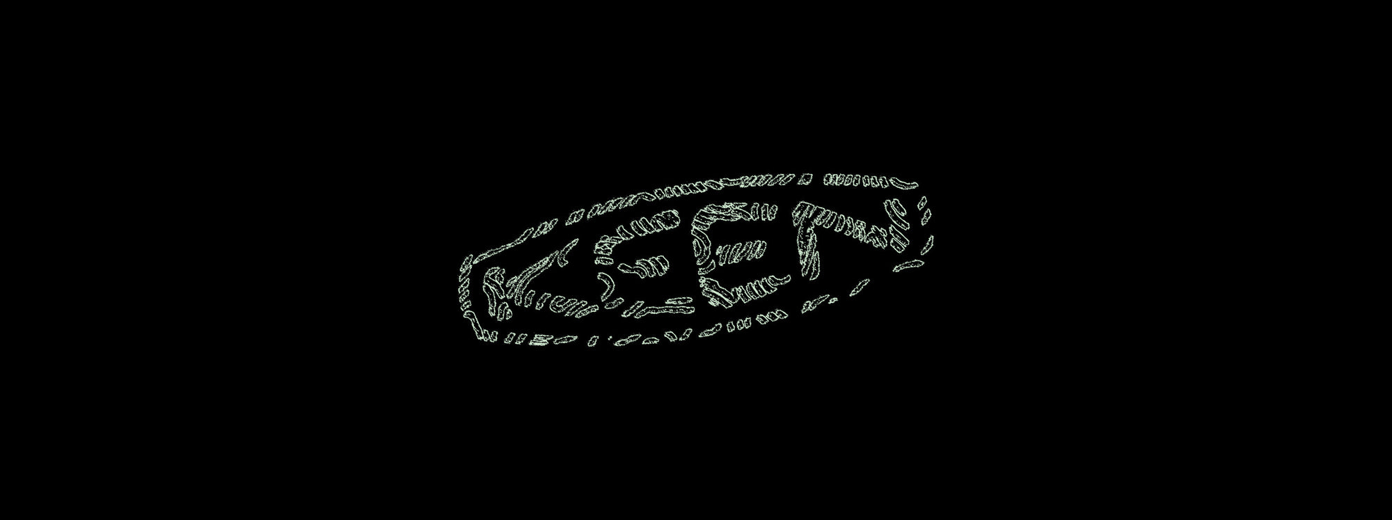 The KEEN logo made out of trail-running shoe tread design.
