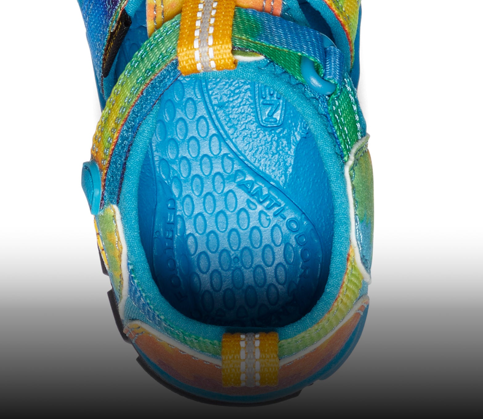A close-up of the inside of a blue Seacamp kids sandal.
