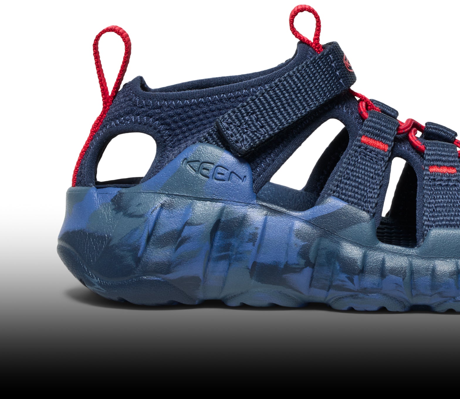 A close-up of a dark blue Hyperport H2 sandal.