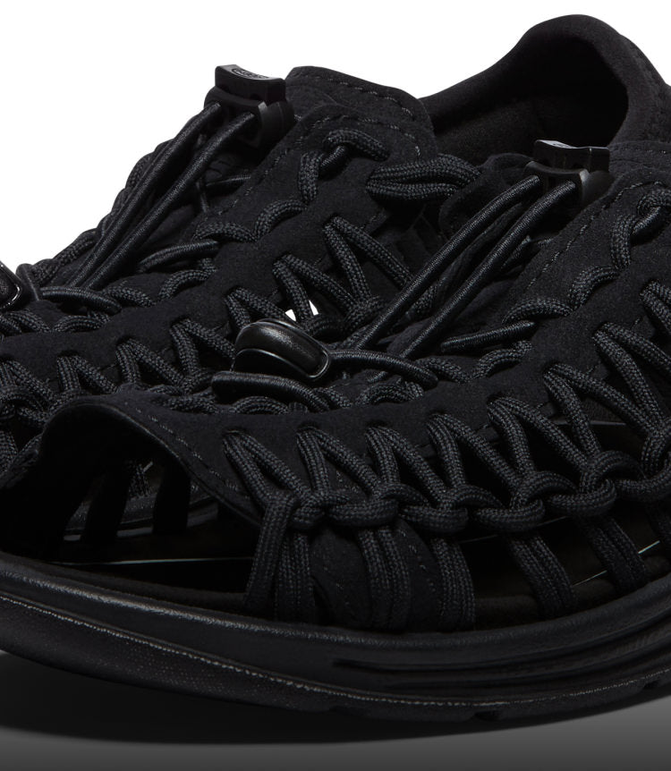 A close-up of a black KEEN UNEEK sandal.