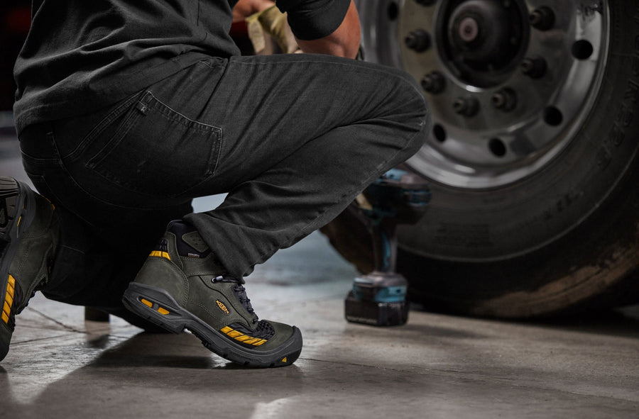 mechanic changing tire in KEEN Troy with KEEN.BELLOWS FLEX
