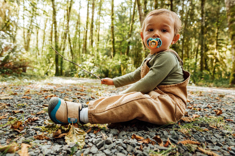 A toddler on a family walk