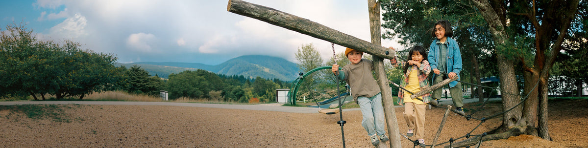 Children playing outside, featuring kids' shoes from KEEN Footwear