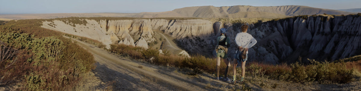 People wearing Zionic hiking boots, on a rocky terrain