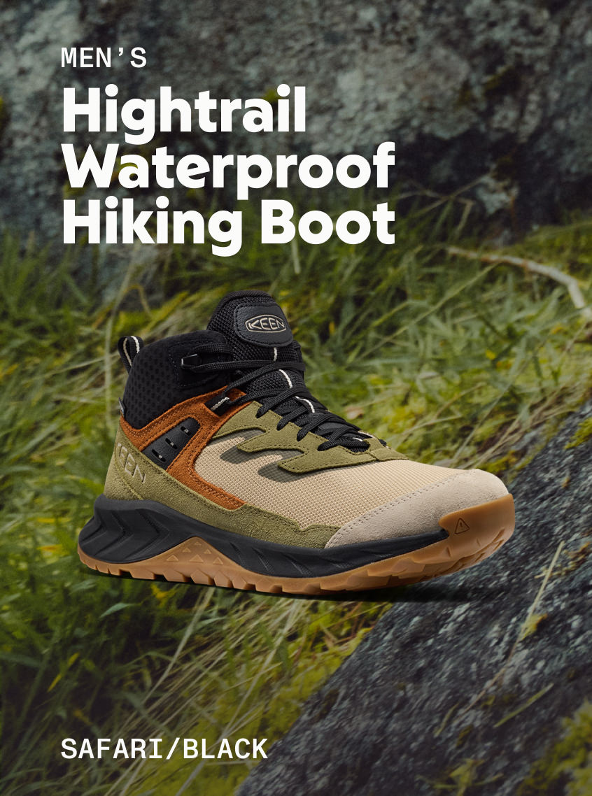 Product shot of Men's Hightrail Waterproof Hiking Boot in Safari and Black against forested trail.