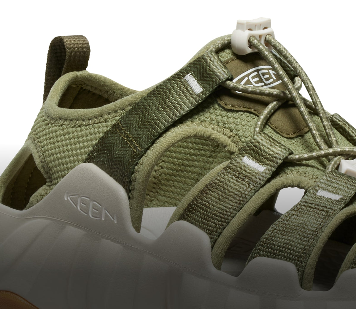 A close-up of a green Hyperport H2 sandal.