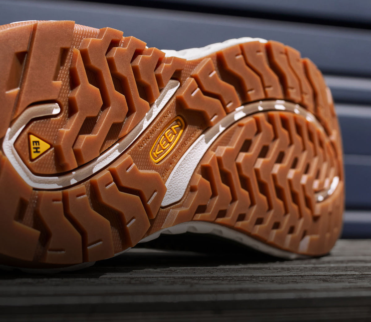 The brown undersole of a KEEN Arvada work shoe.