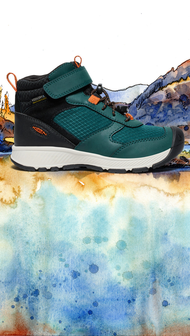 Product shot of kids' turquoise Skua waterproof boot against waterscape fall-lake watercolor background