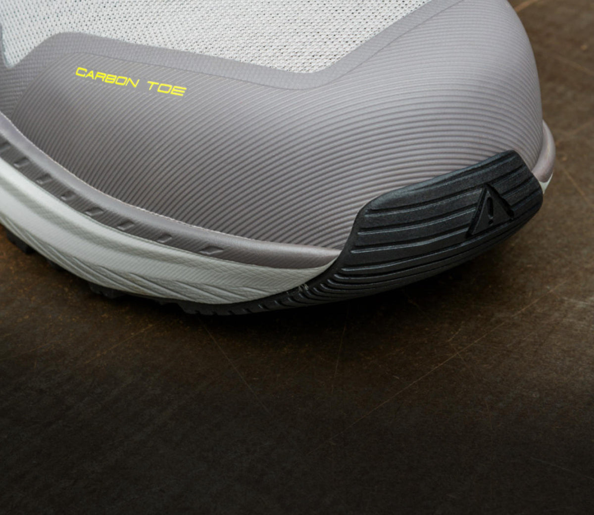 A close-up of the front of a carbon-toe KEEN work sneaker.