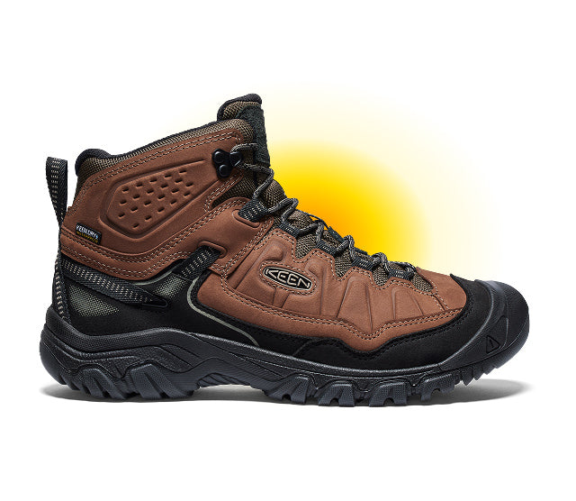 Product shot of men's brown leather Targhee hiking boot against white and yellow gradient background