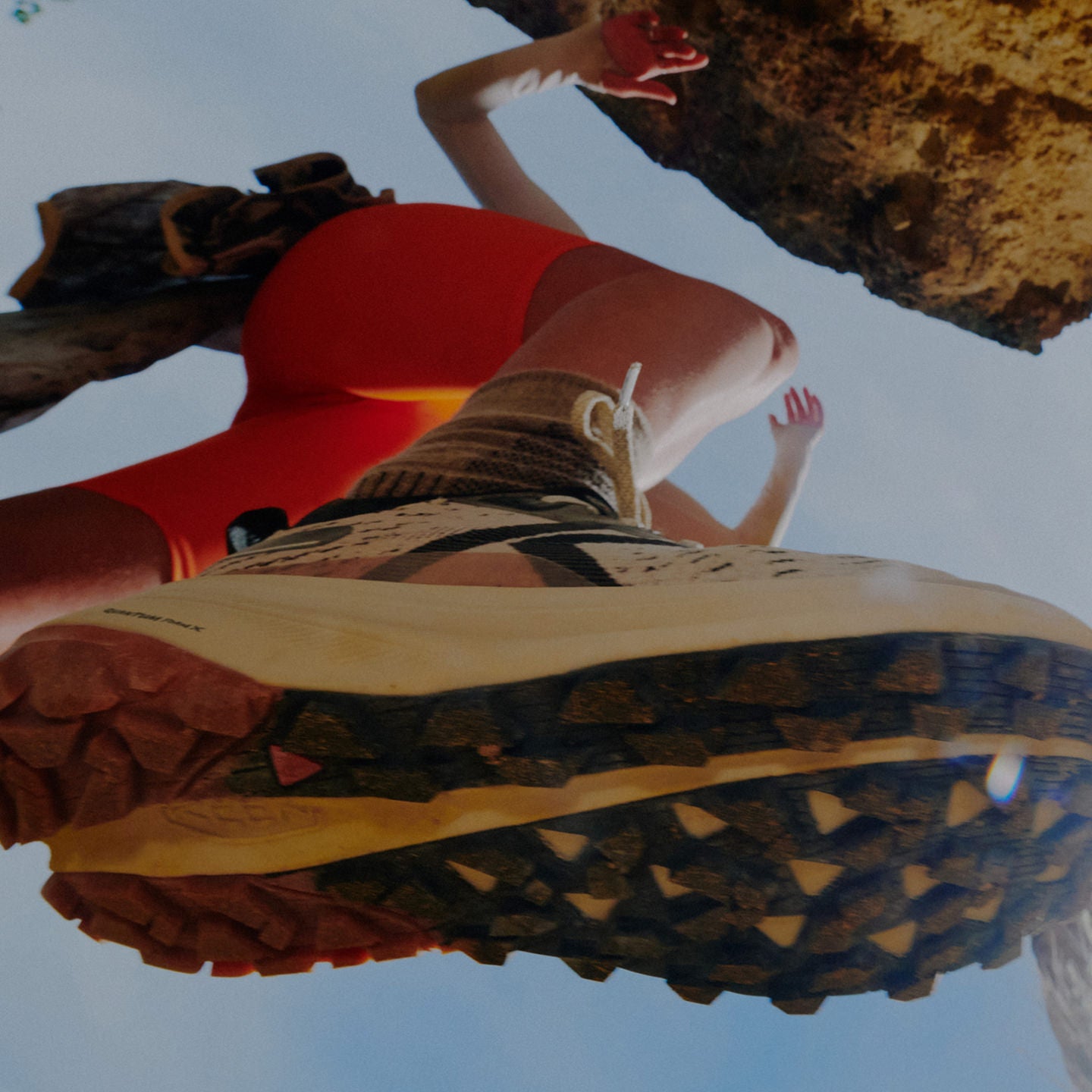 View from ground featuring tread on the bottom of women's seek running shoe