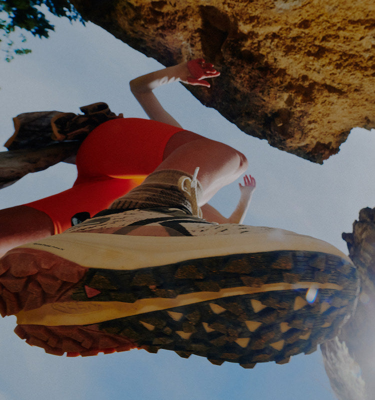 View from ground featuring tread on the bottom of women's seek running shoe