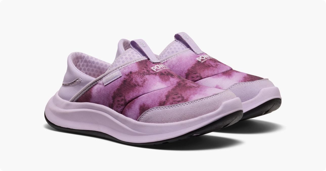 Product shot of women's slip-on Whyser shoe with bright pink gradient design