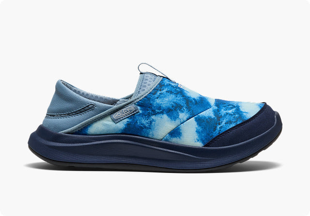 Product shot of men's slip-on Whyser shoe with bright blue gradient design