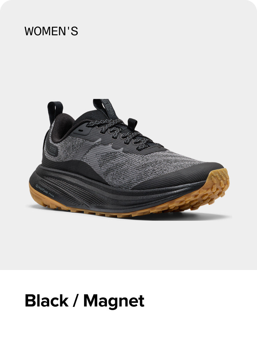 Product shot of women's Black and Magnet Roam trail-running shoe.