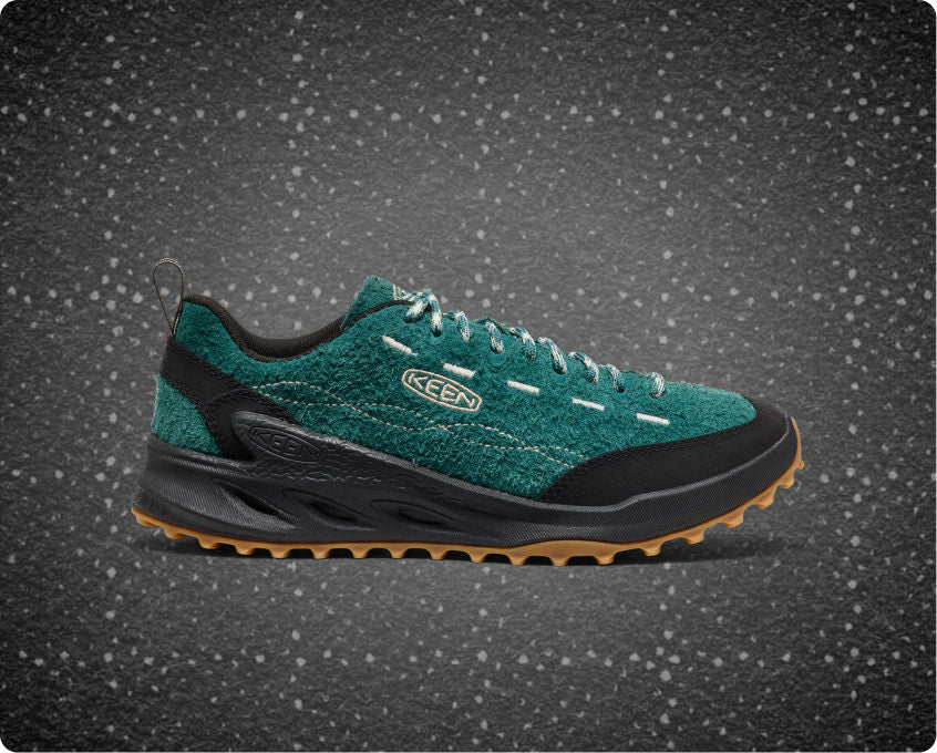 Women's green and black Jasper casual shoe featuring a durable black sole, designed for outdoor adventures and casual wear.