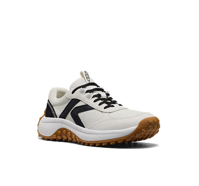 Studio shot of women's KS 86 leather sneaker in black and white