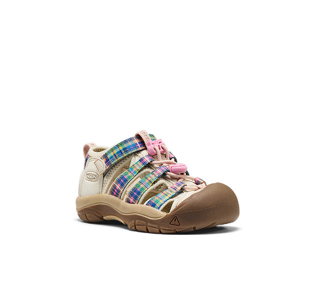 Studio shot of a little kids' newport shoe with plaid detail and pink bungee laces. 
