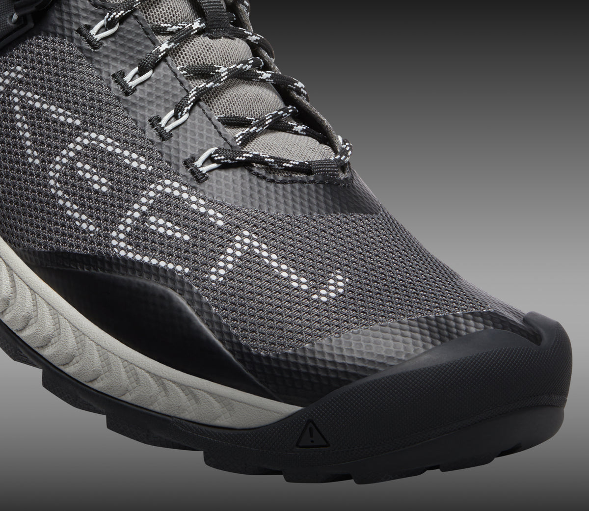 Closeup view of toe gaurd on NXIS hiking shoe. 