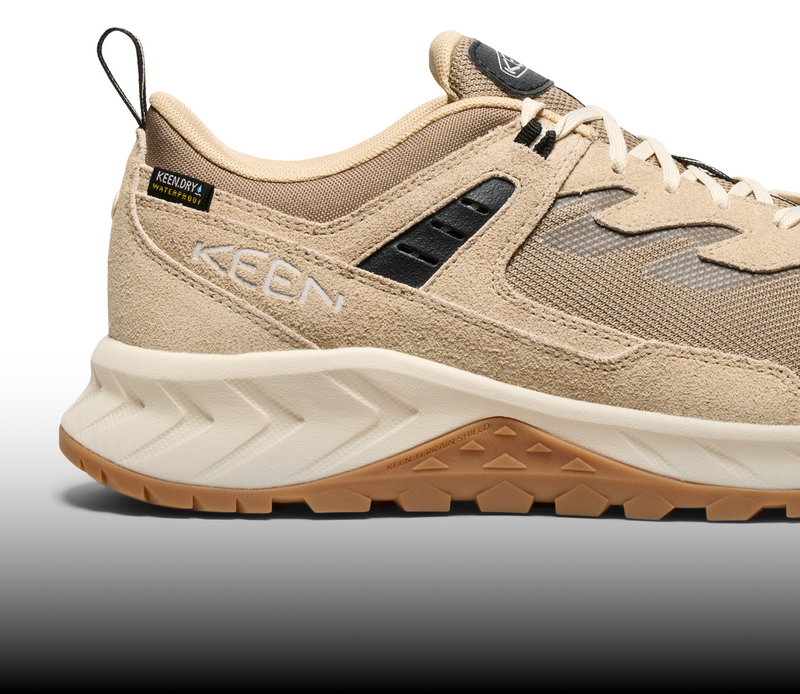 A close-up of the heel of a cream KEEN Hightrail sneaker.