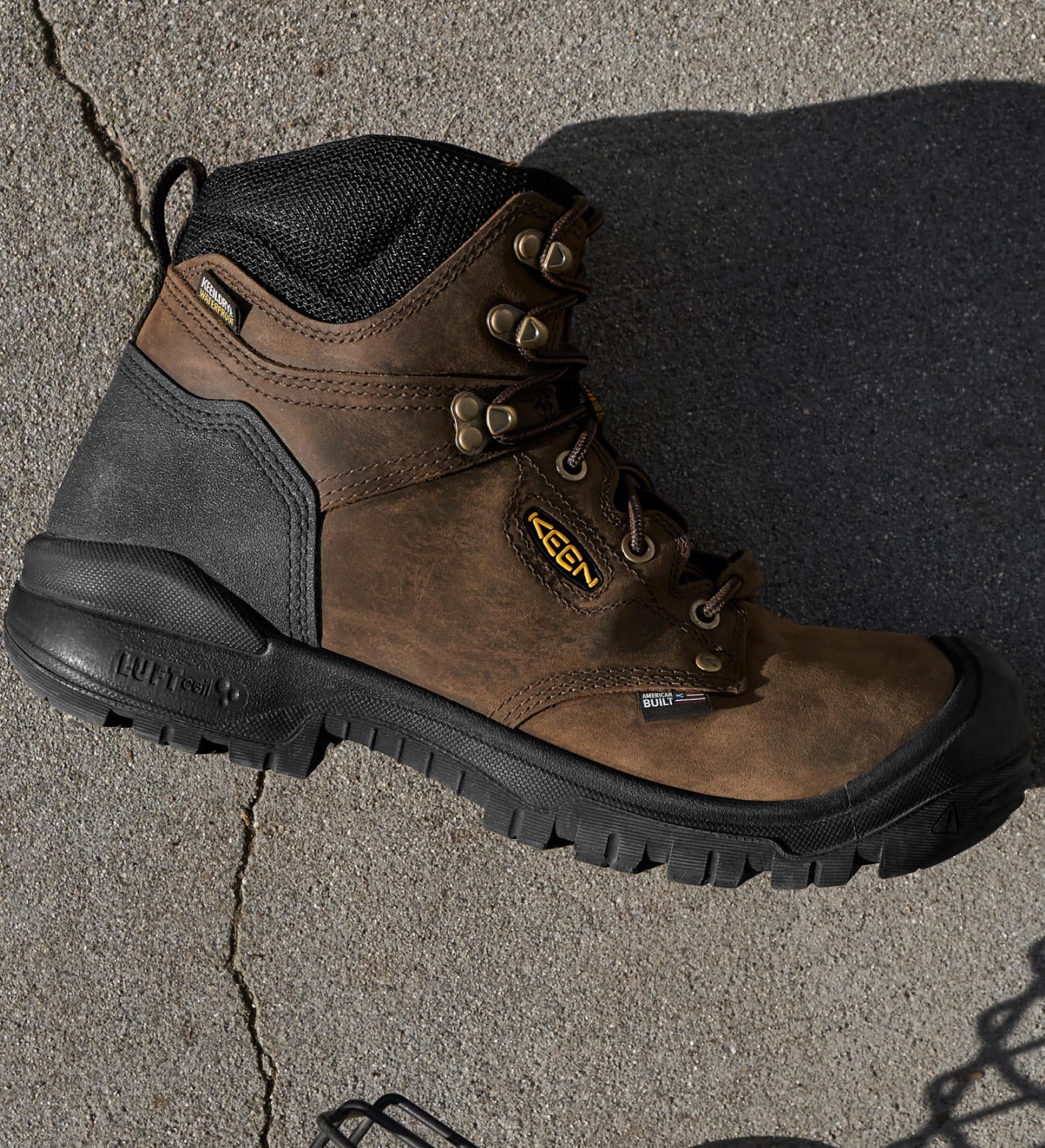Product shot of men's Independence work boot on cement