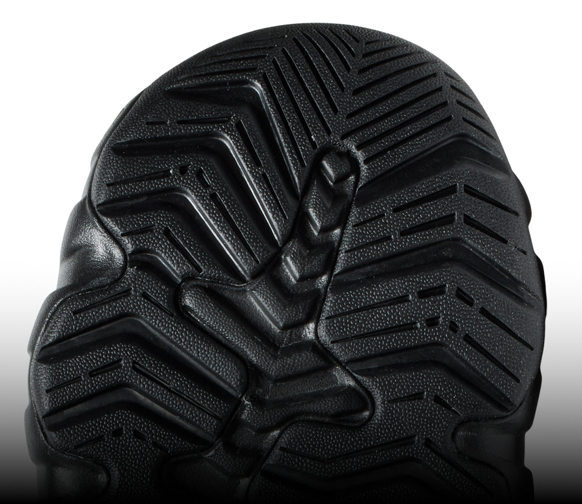 A close-up of the black undersole of a Hyperport sandal.
