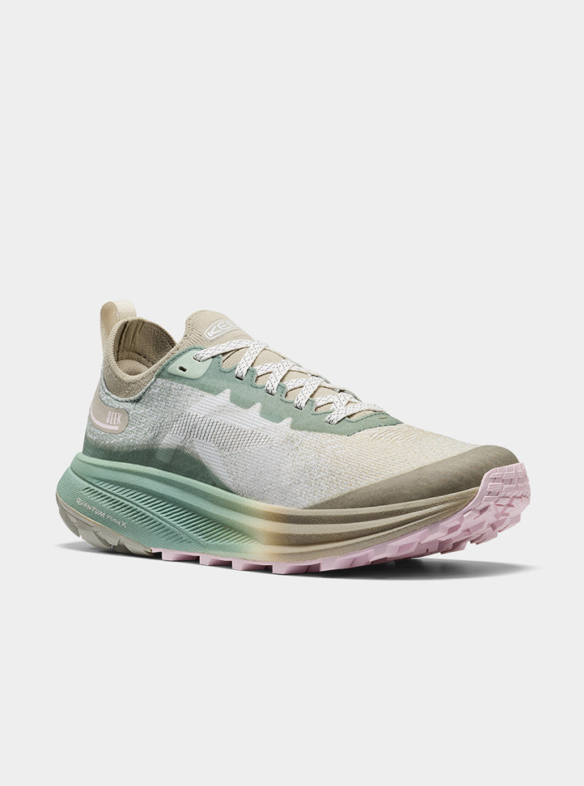 Product shot of women's turquoise and pink Seek Running shoe.