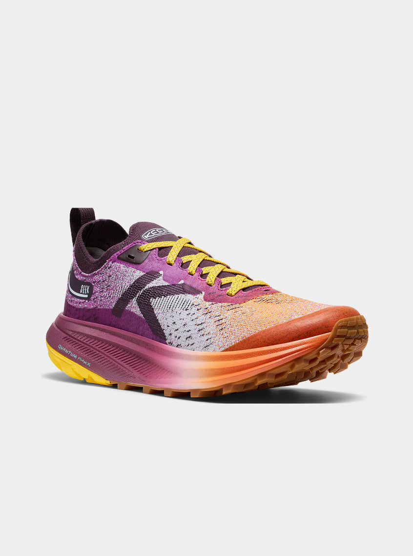 Product shot of women's willowherb and orange Seek Running shoe.
