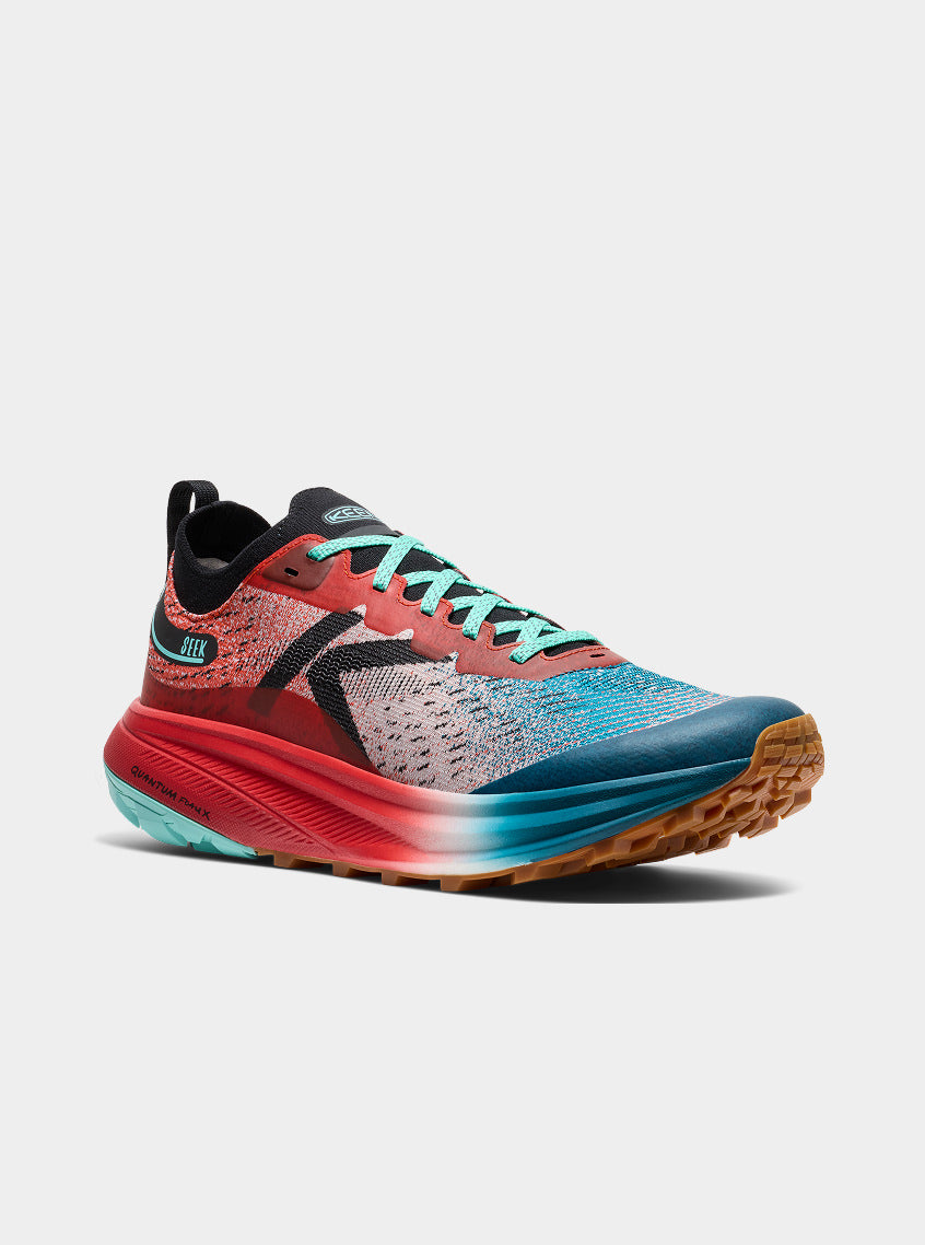 Product shot of women's blue and red Seek Running shoe.