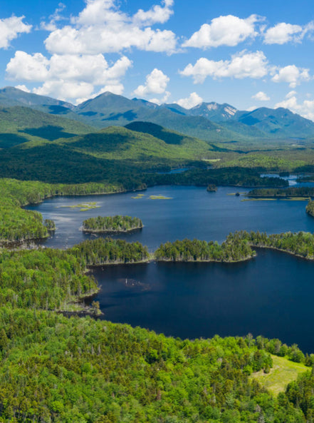 View of mountain lakes with many clouds on a sunny day.