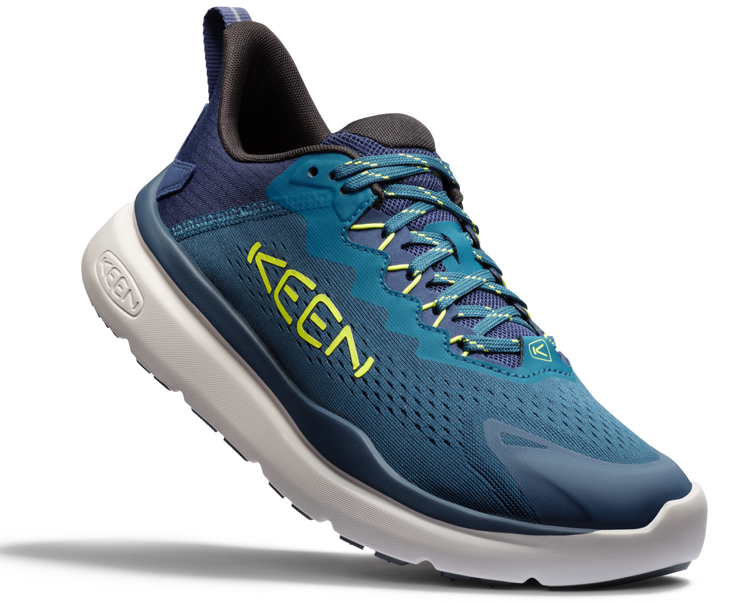 Product shot of men's blue WK450 walking shoe.