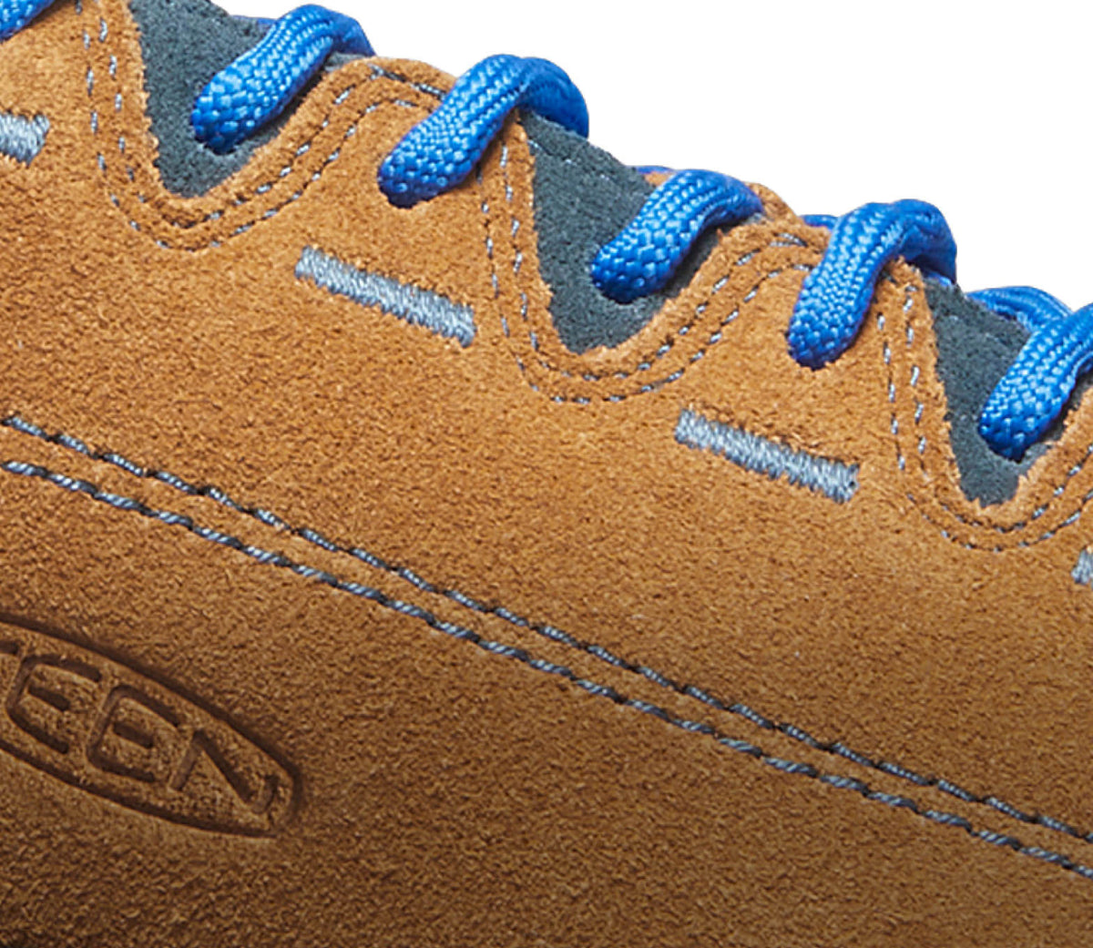 A close-up of a brown and blue KEEN Jasper sneaker.