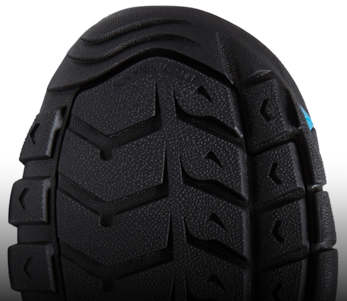 A close-up of the black undersole of a Newport sandal.