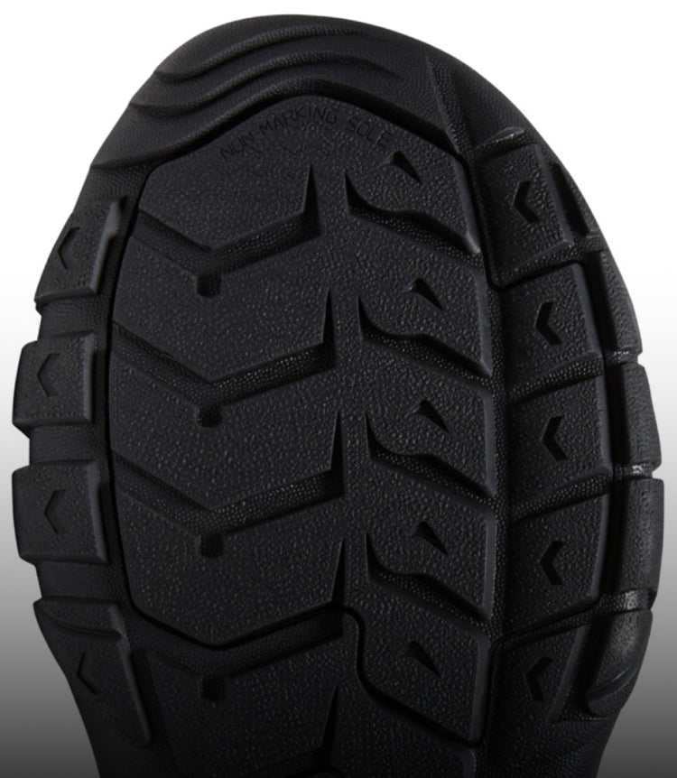 A close-up of the black undersole of a Newport sandal.