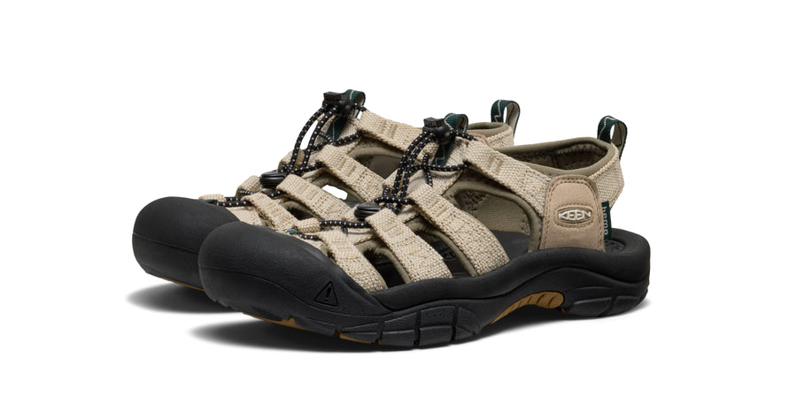 Studio product shot of women's tan KEEN x Gramicci collaboration hiking sandals against white background.