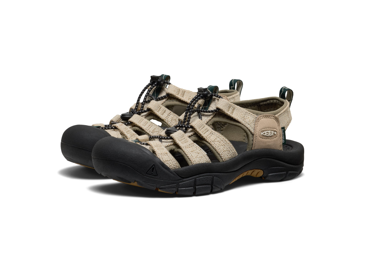Studio product shot of women's tan KEEN x Gramicci collaboration hiking sandals against white background.
