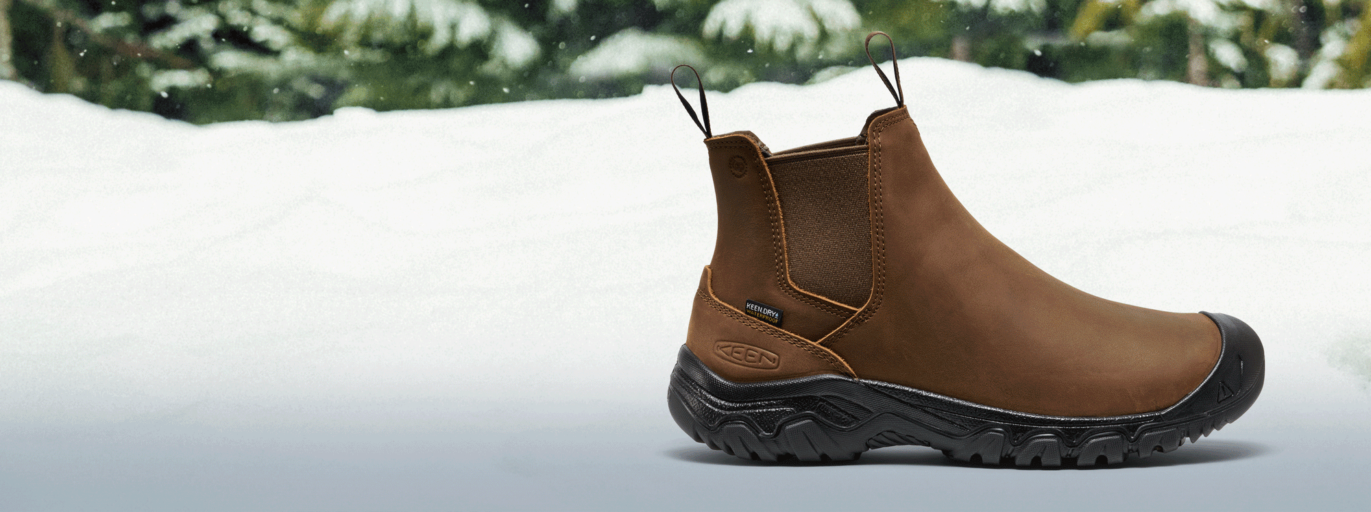 Gift of changing KEEN insulated boots with snowy background