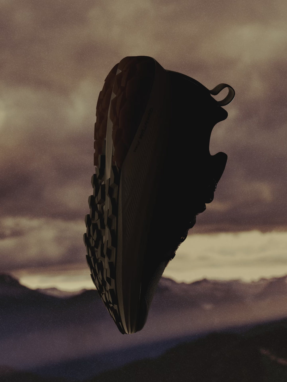 Video of Seek running spinning on it's toe image over with a mountain and clouds in the background